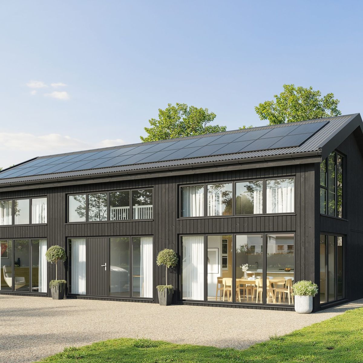 A computer generated image of a black timber clad house with a solar roof, seen across a gravel drive and lawn