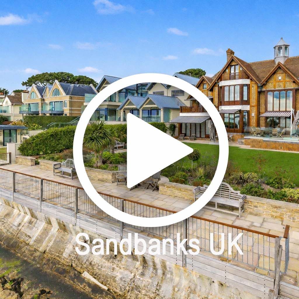 A video still of a waterfront house and terrace at Sandbanks with a large play button over it